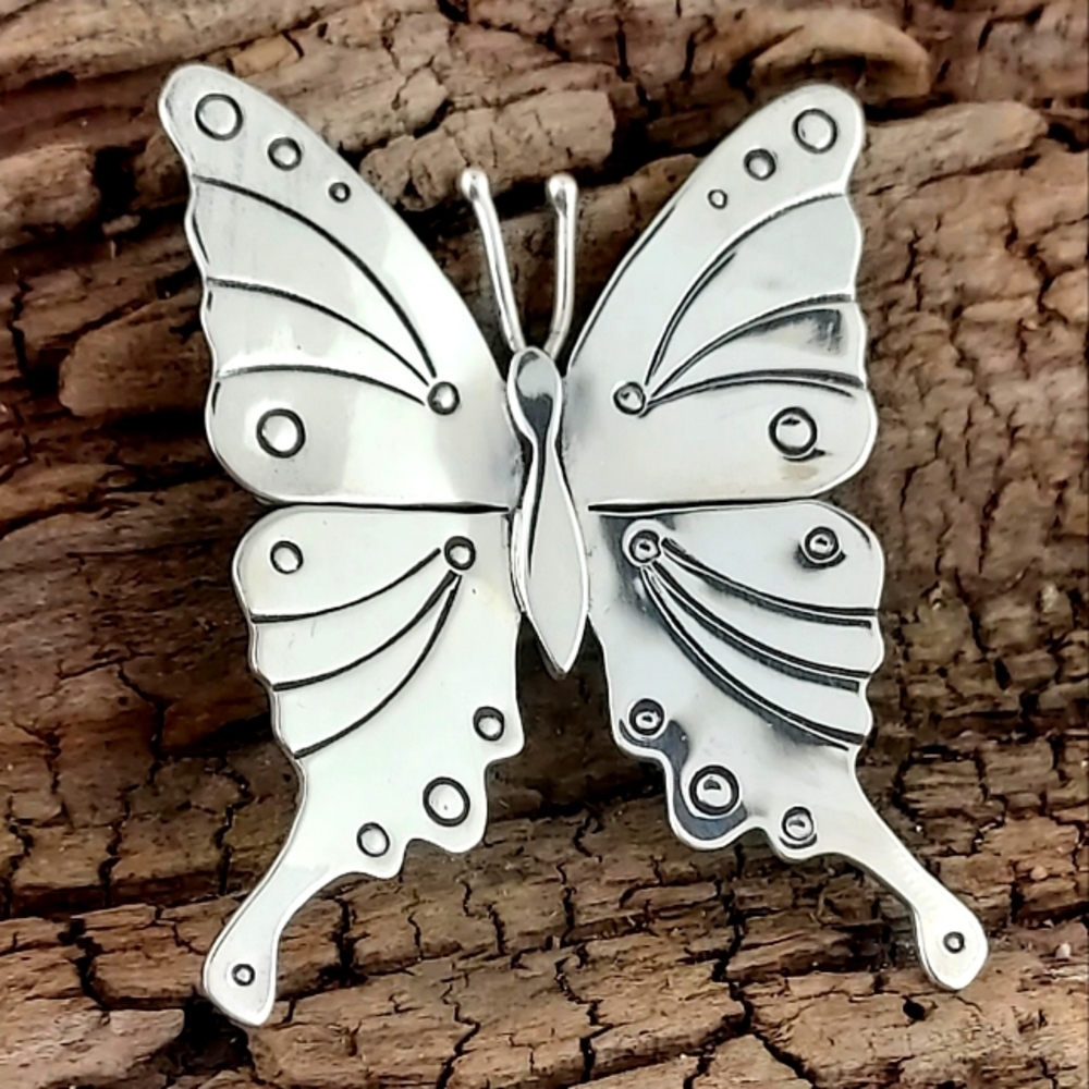 Handmade Sterling silver butterfly pendant.